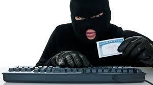 person wearing a ski mask holding a social security card