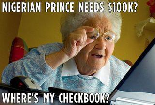 older lady looking at a laptop with text saying Nigerian Prince Needs $100K? What's my checkbook?